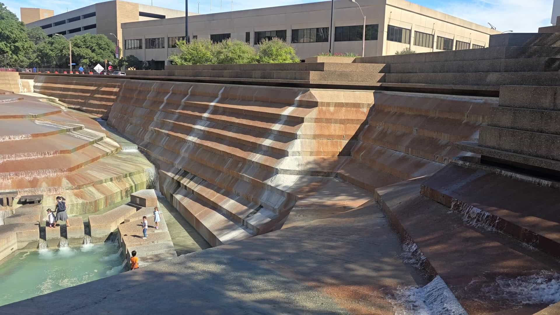 Angular concrete terraces of the Active Pool at the Fort Worth Water Gardens