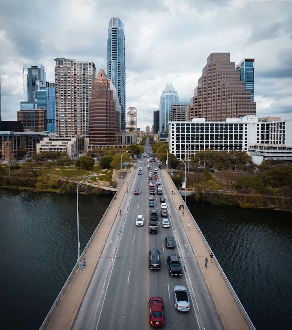 Congress Avenue Bridge leading into the downtown Austin skyline, Texas