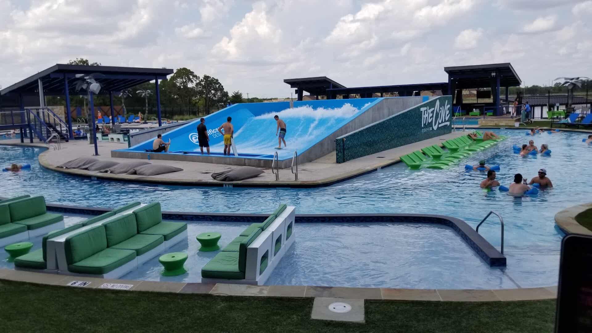 Guests floating on tubes down the lazy river at The Cove at BearX in College Station, Texas