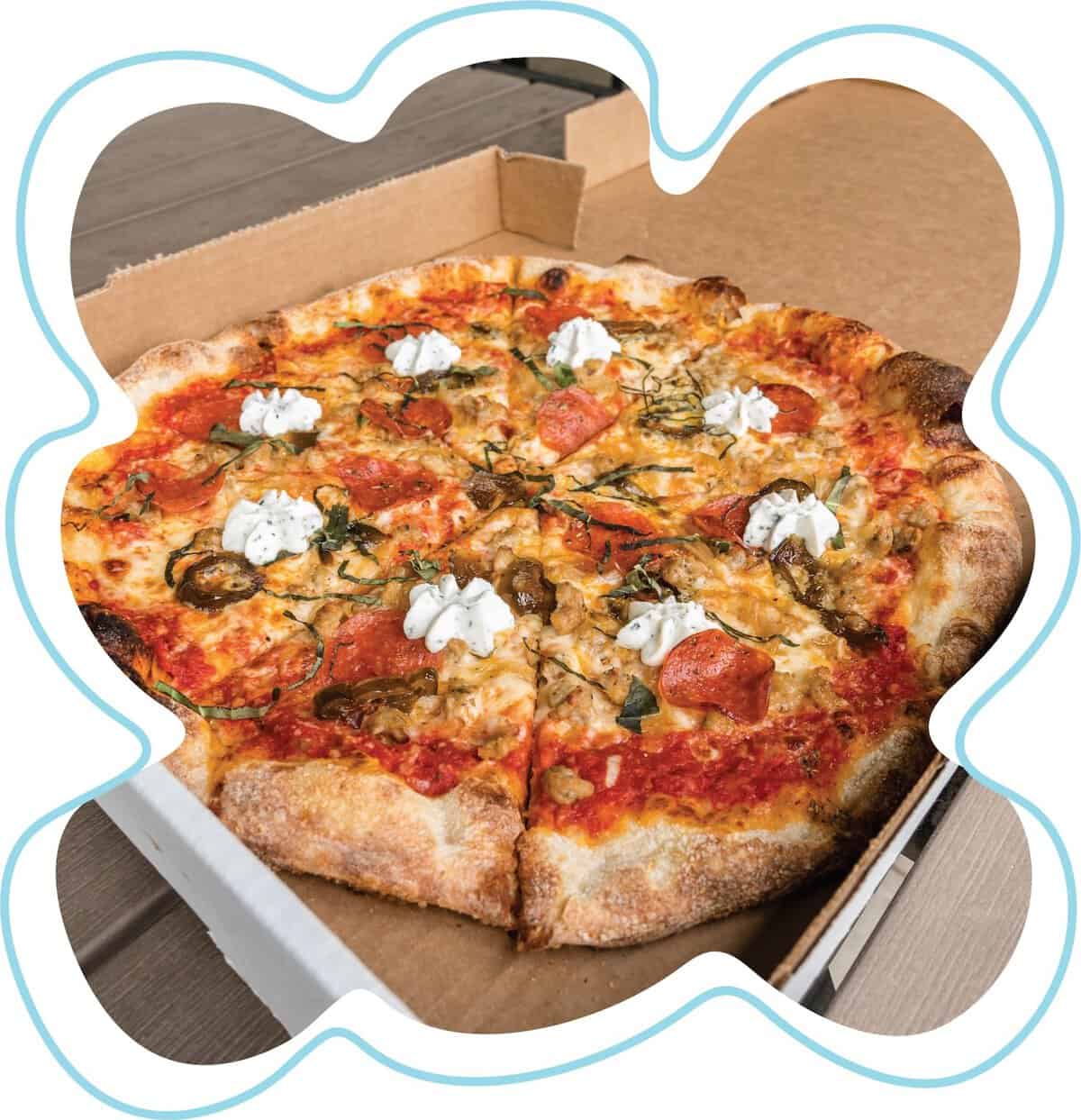 Fresh pizza from the pizza bar at The Cove at BearX in College Station, Texas