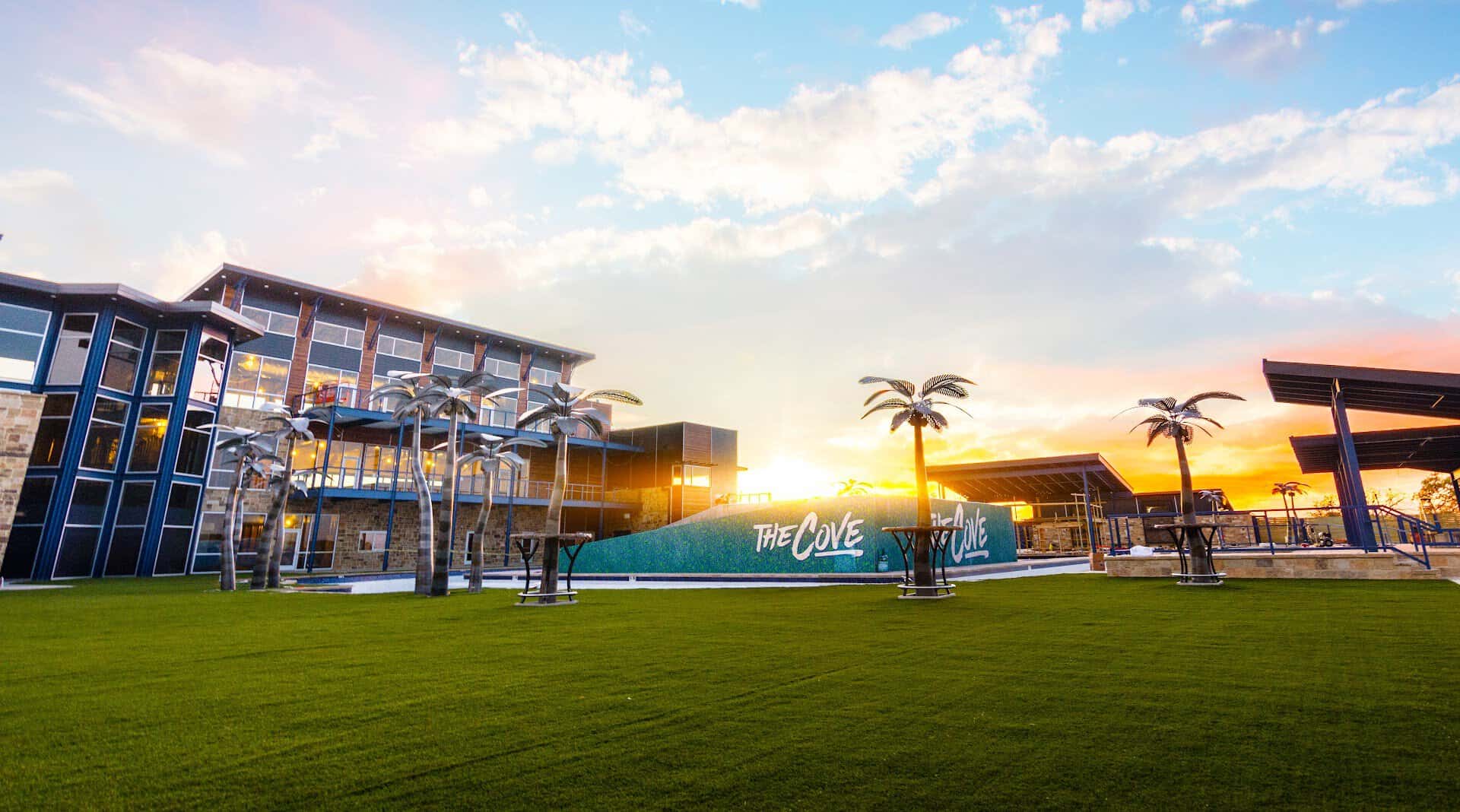 The Cove at BearX resort and lawn at sunset in College Station, Texas