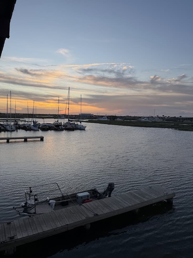 Boats at Cove Harbor marina at dusk near Paradise Key in Rockport, Texas