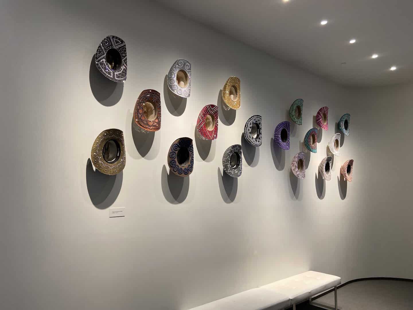 Wall of decorative pottery on display at the National Cowgirl Museum in Fort Worth