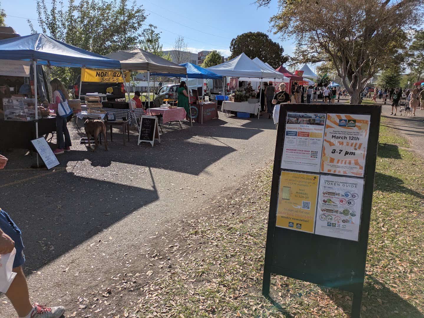 Open-air market tents at the Crescent City Farmers Market in New Orleans