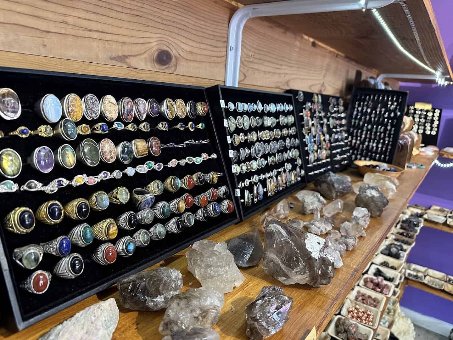 Cabochons and crystal jewelry in cases at Shiny Things For Shiny People in Austin