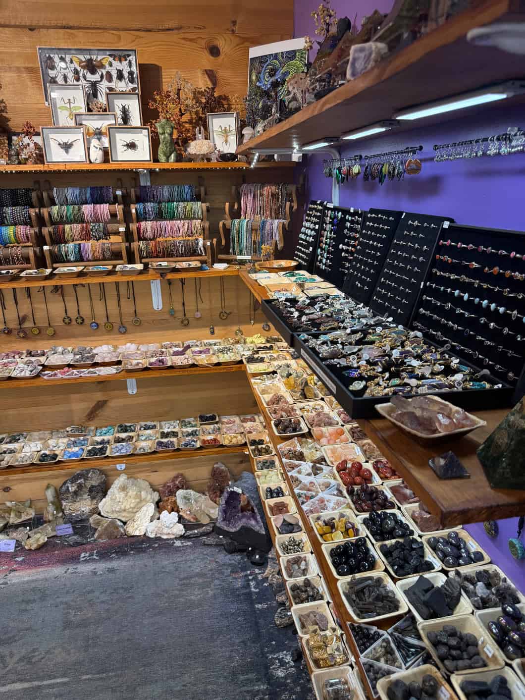 Shelves and display cases of crystals at Shiny Things For Shiny People in Austin