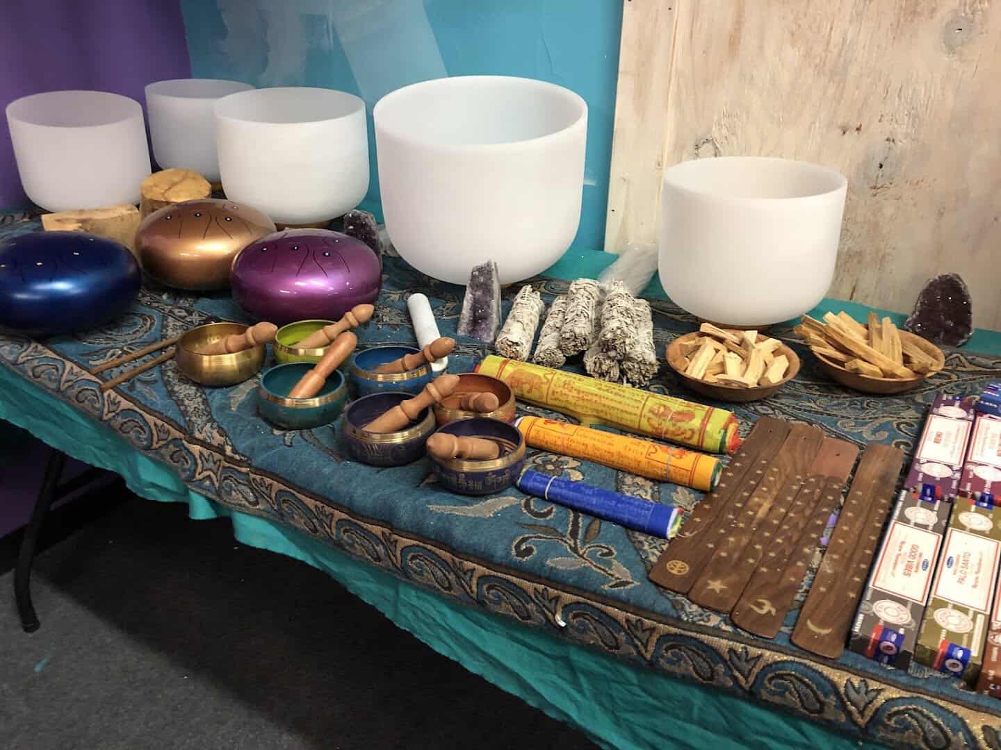 Crystal singing bowls and palm stones at Shiny Things For Shiny People in Austin