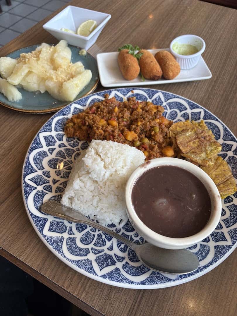 Cuban croquetas and fried yuca appetizers at Cafe Piquet in Bellaire, Texas