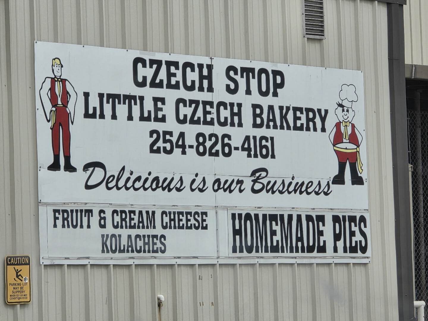 Czech Stop and Little Czech Bakery sign advertising fruit and cream cheese kolaches in West, Texas