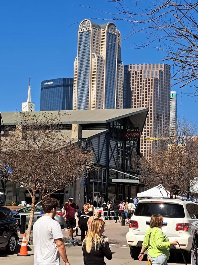The Dallas Farmers Market with the downtown Dallas skyline behind it
