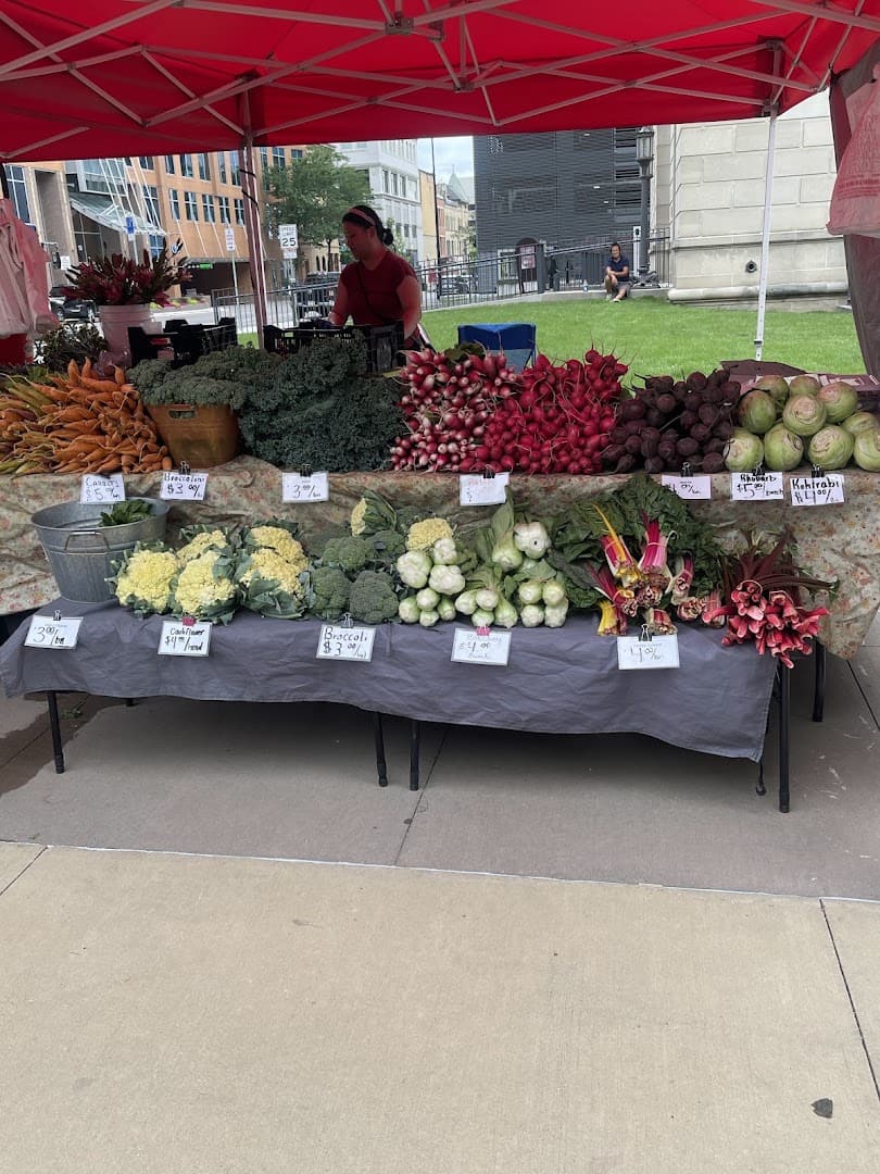 A produce vendor table at the Dane County Farmers Market in Madison, Wisconsin
