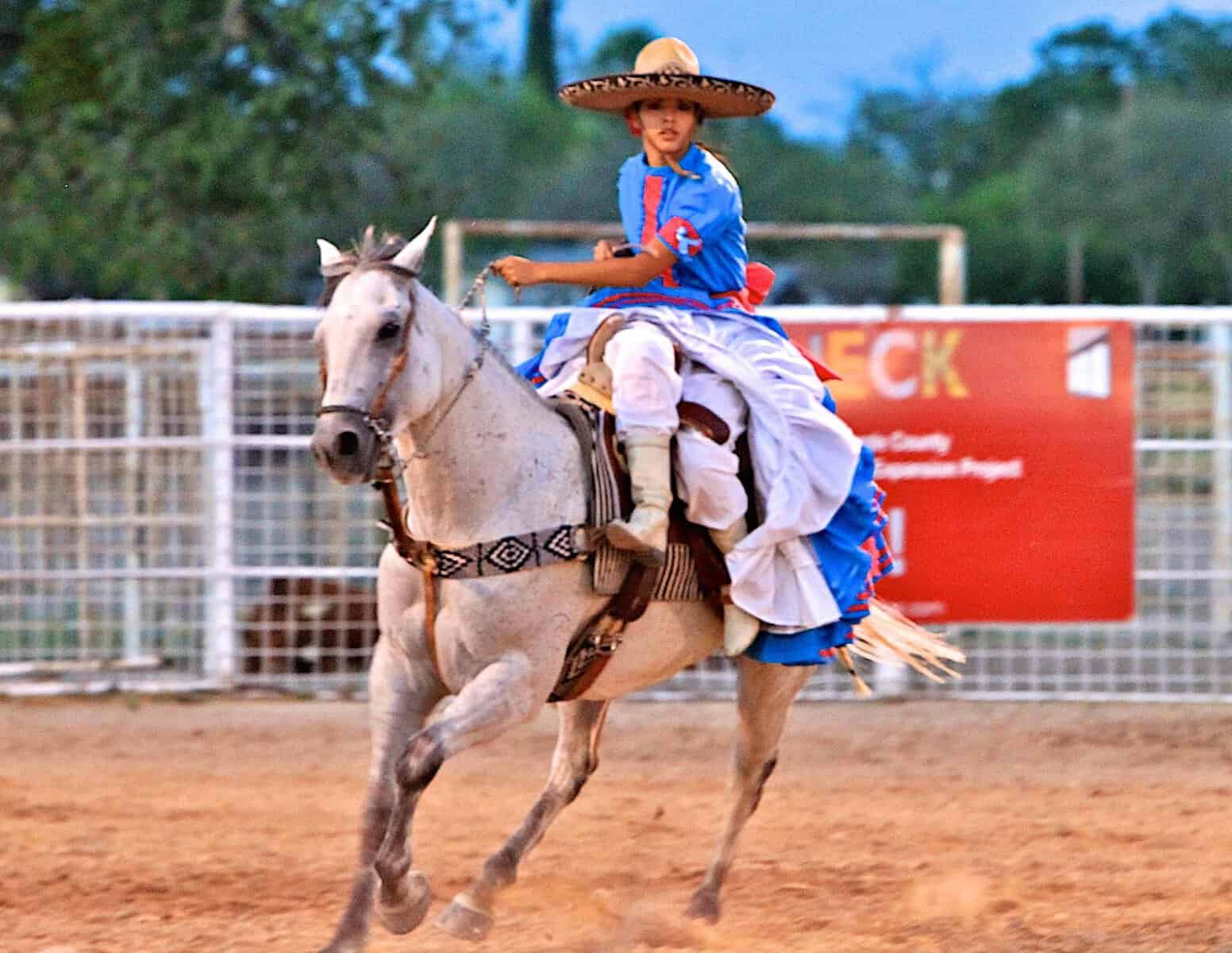 A charro riding at a charreria event in Del Rio, Texas