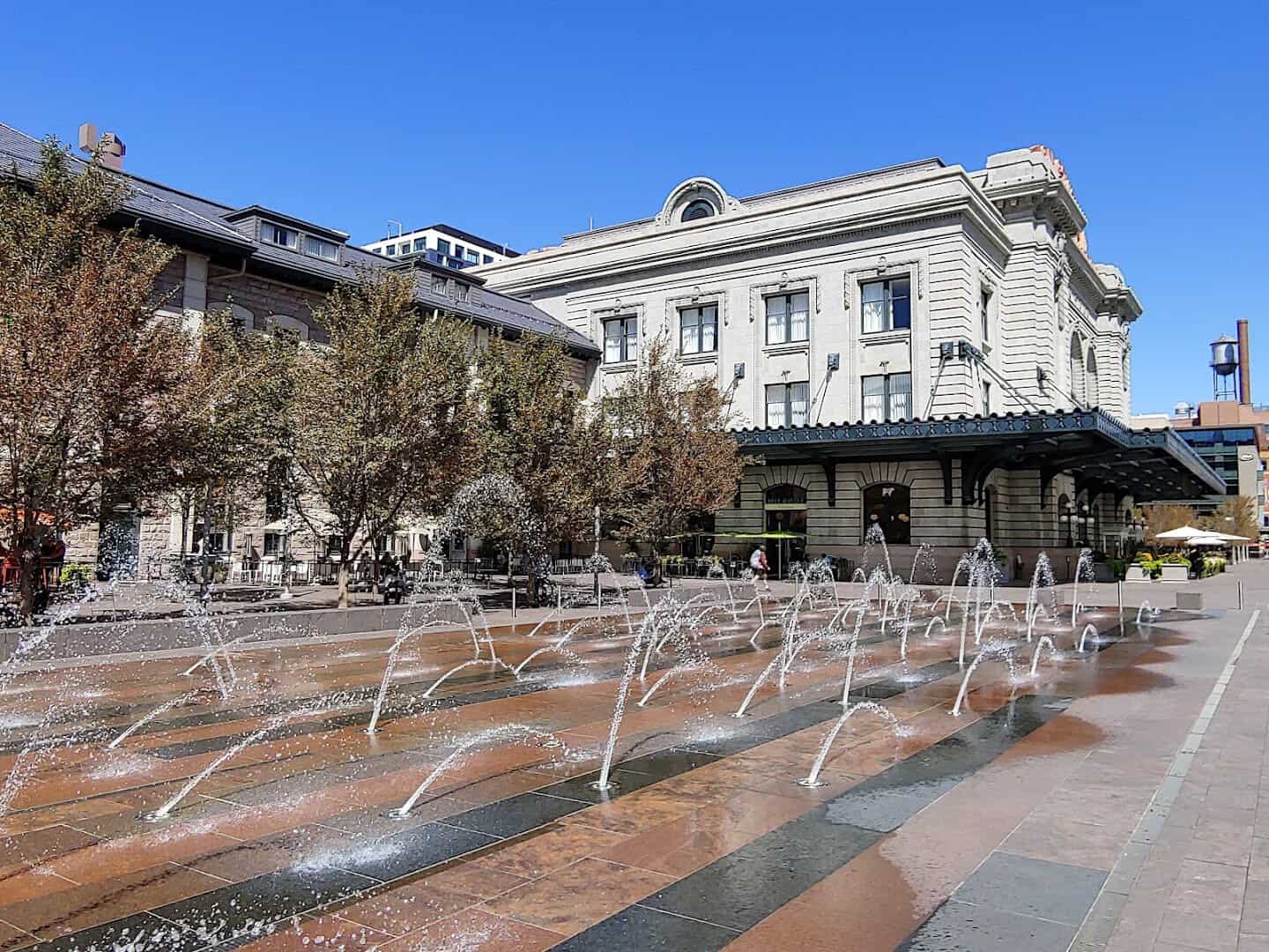 Denver Union Station and its plaza fountains in Denver, Colorado