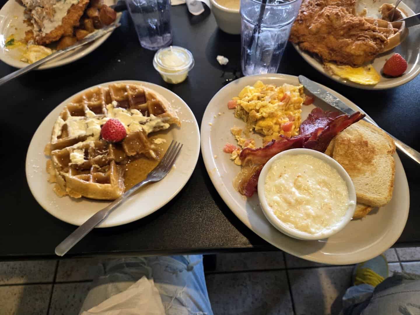 A full table spread of breakfast plates at Jonathon's Diner in Dallas