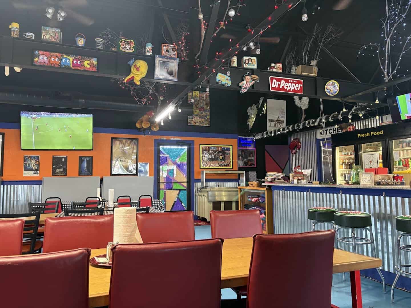 Dining room, bar and arcade area inside Mel's Diner in Mingus, Texas