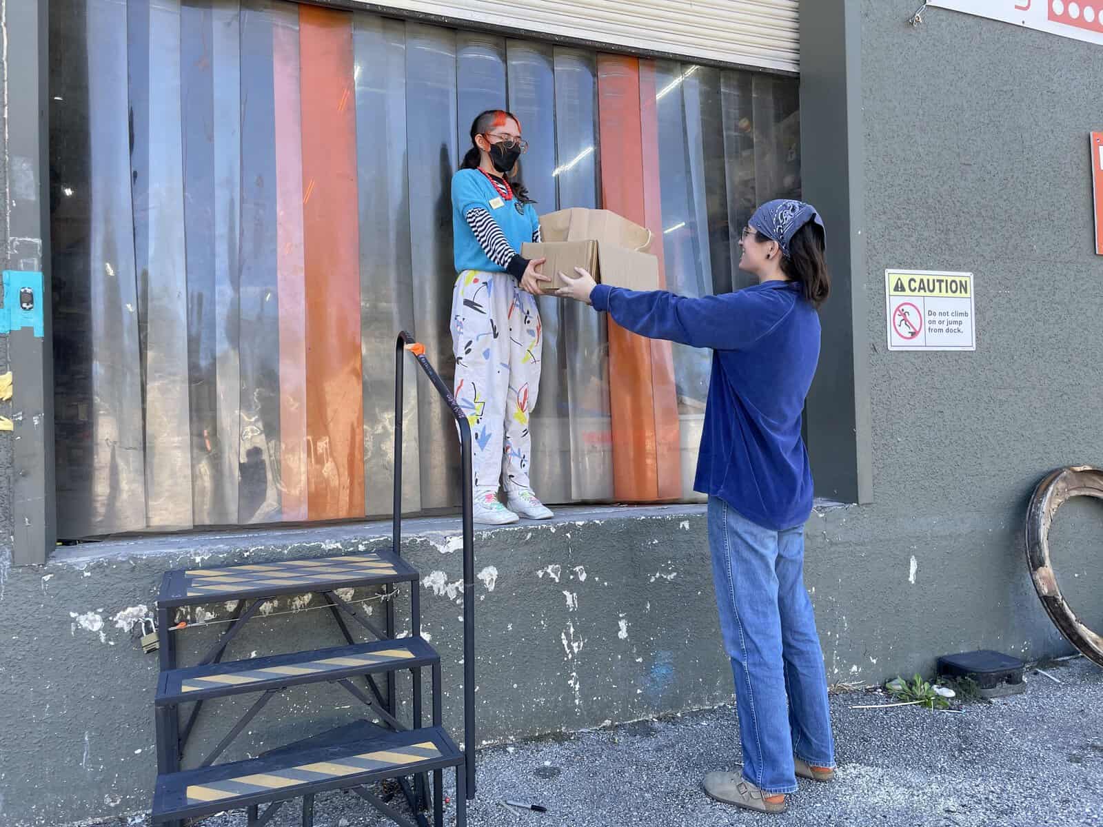 Volunteers accepting a donation of materials at Austin Creative Reuse