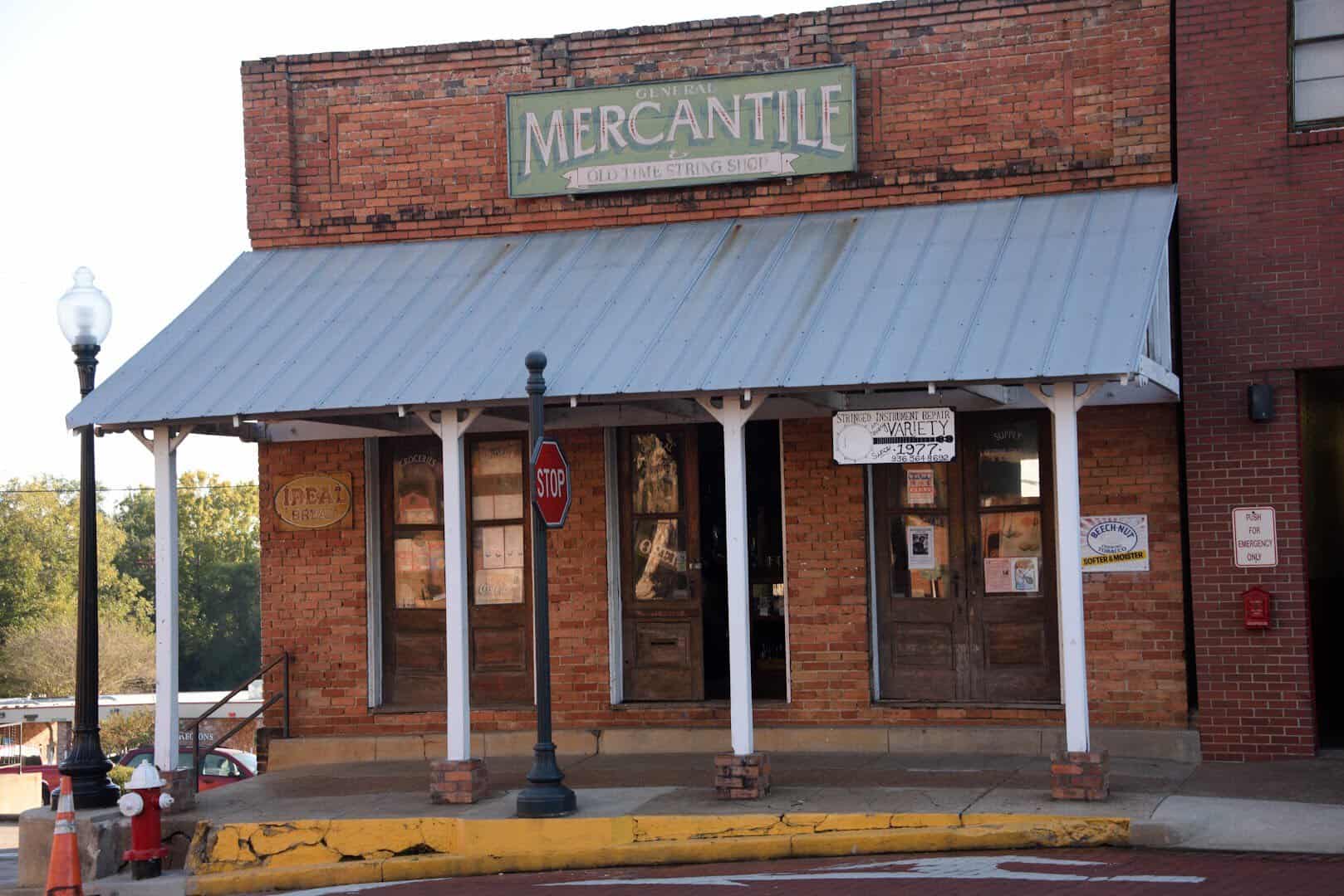 Historic Mercantile brick storefront with columns in downtown Nacogdoches, Texas