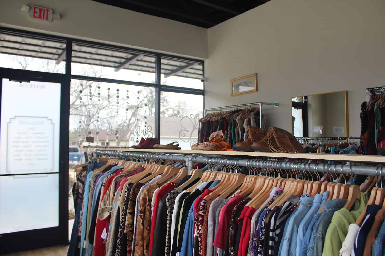 Curated vintage clothing racks at Earthy Finds Vintage in Bryan, Texas