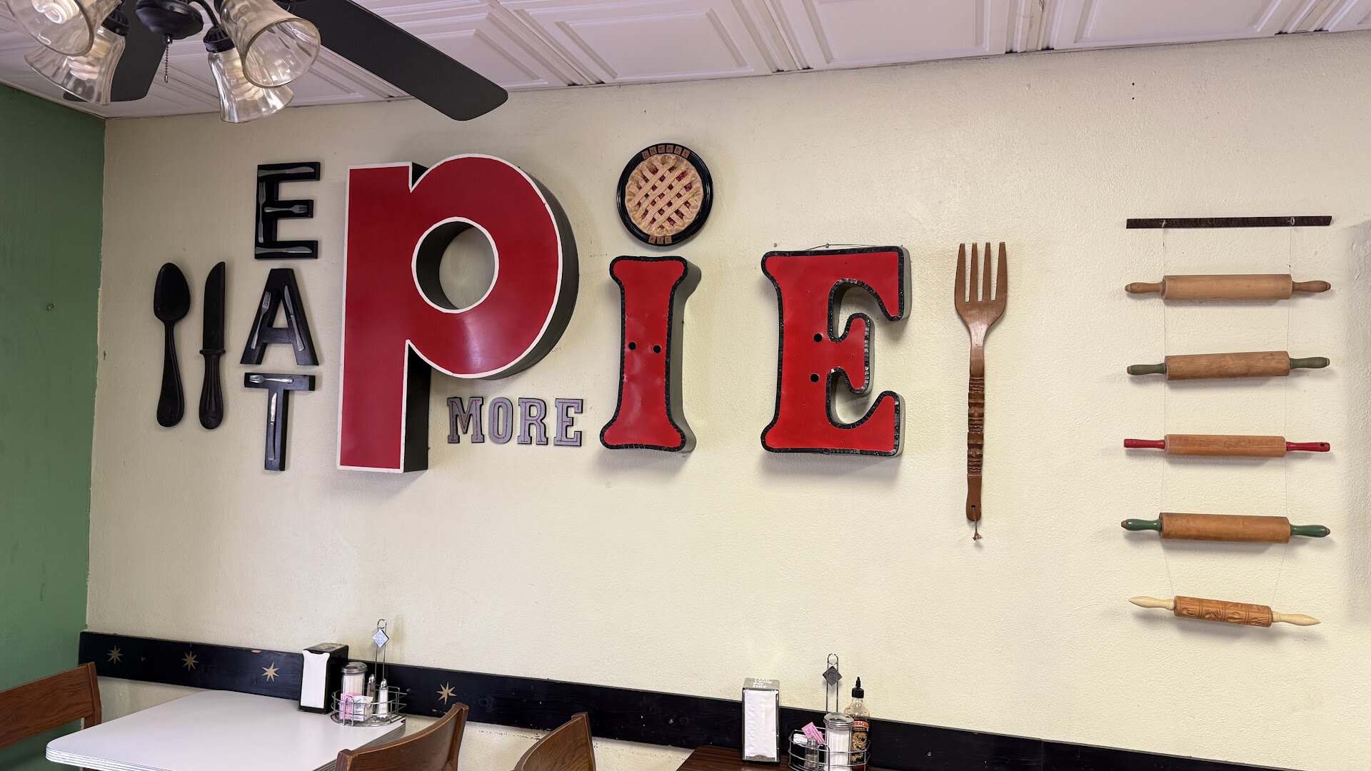 Eat More Pie wall art and rolling pins at Texas Pie Company in Kyle, Texas