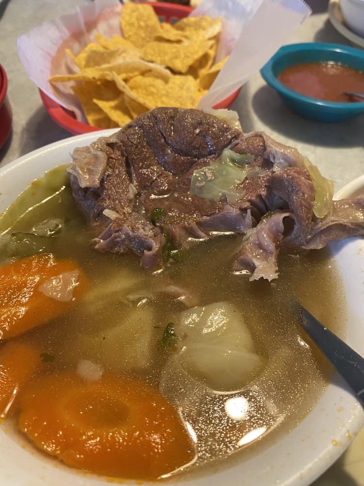 Slow-cooked beef barbacoa in broth at El Jacalito in Austin, Texas