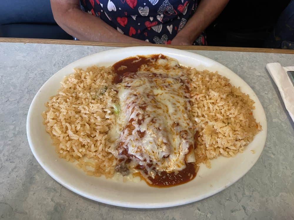 Cheese enchiladas in red sauce with rice at El Jacalito in Austin, Texas