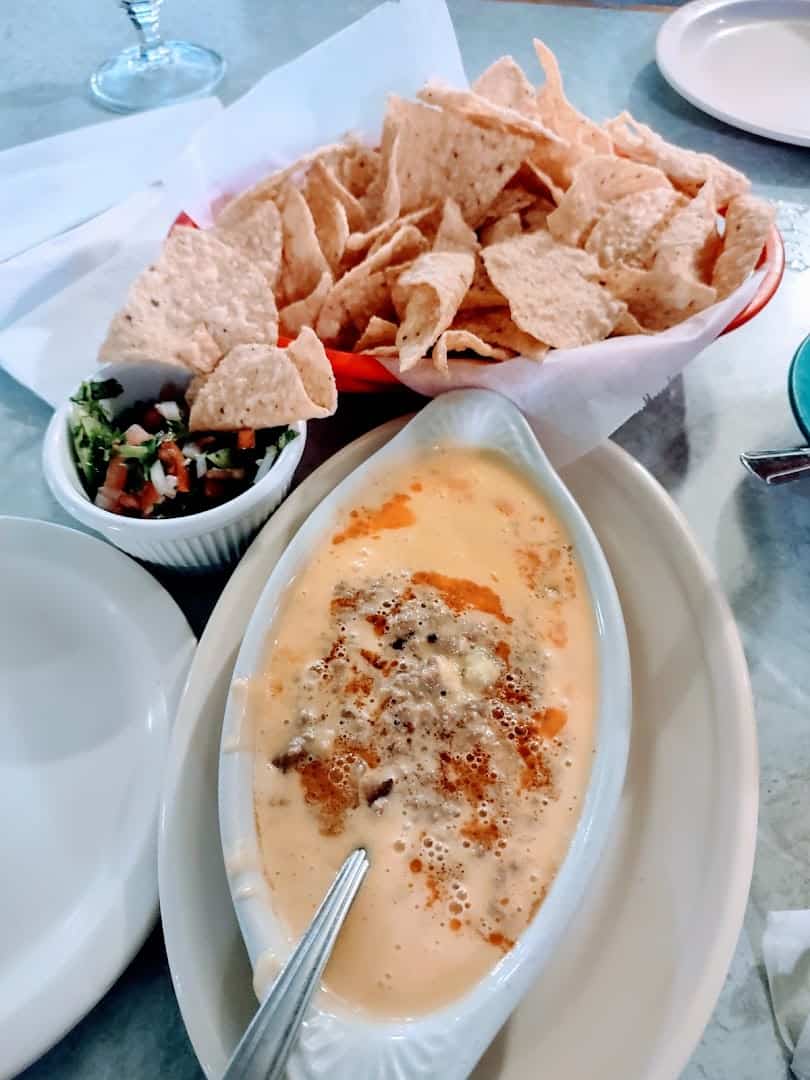 Queso dip with tortilla chips and pico de gallo at El Jacalito in Austin, Texas