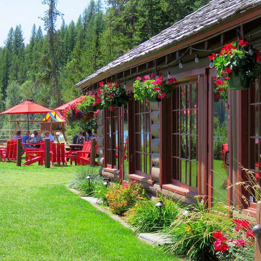 Cedar cabins with flowers at Elkins Resort on Priest Lake, Idaho