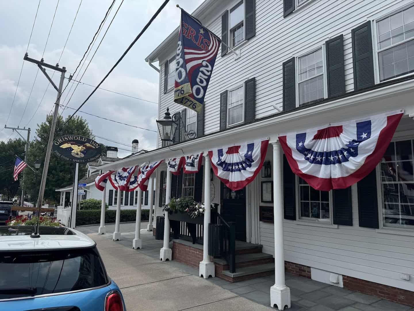 Historic building with patriotic bunting on Main Street in Essex, Connecticut