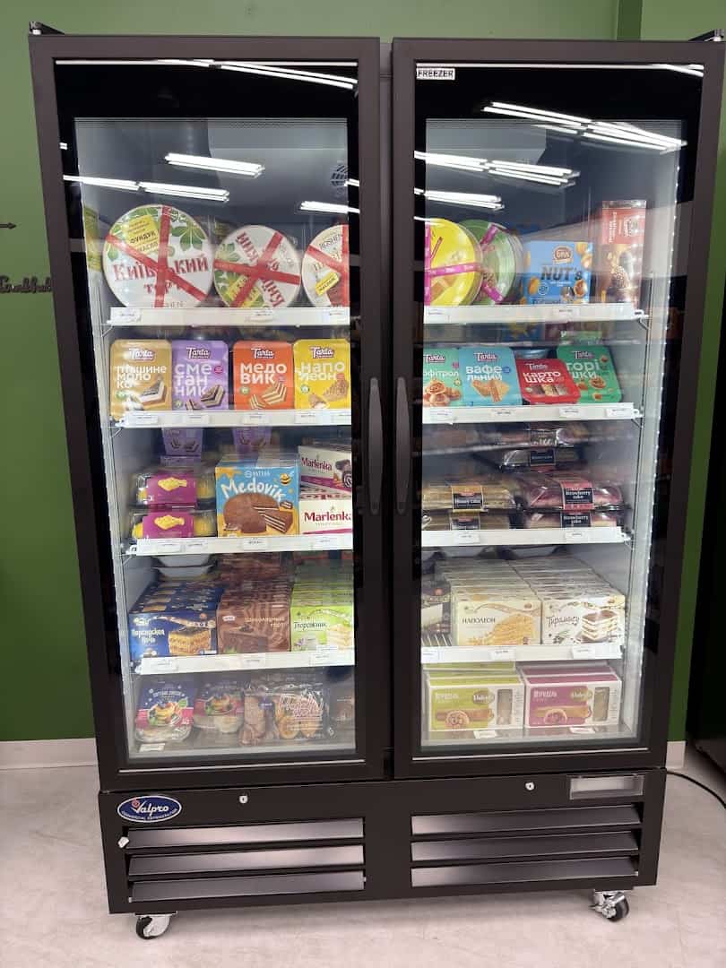 Freezer of imported European cakes at Gourmet European Market in Dallas