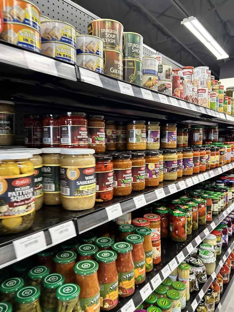 Shelves of imported pickles, spreads and sauces at Gourmet European Market in Dallas