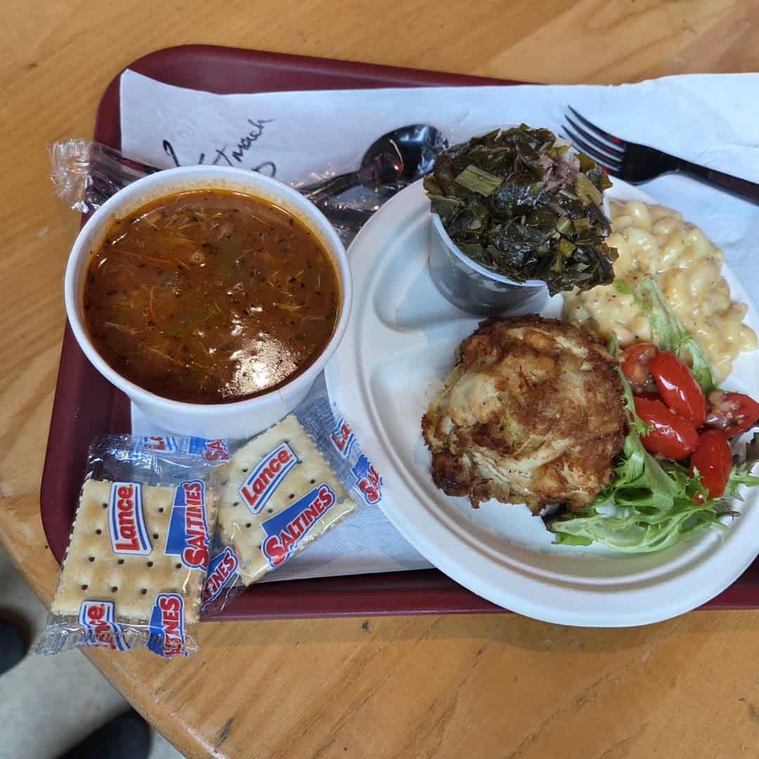 Jumbo lump crab cake with Maryland crab soup at Faidley's Seafood in Baltimore, Maryland