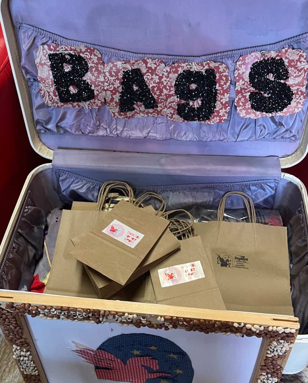 Filled paper bags of donated supplies at Pegasus Creative Reuse in Dallas
