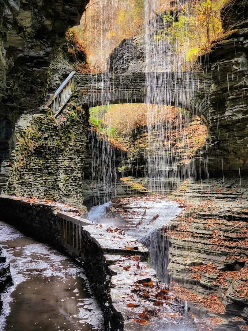Autumn leaves and a waterfall in the Watkins Glen gorge, Finger Lakes, New York in fall