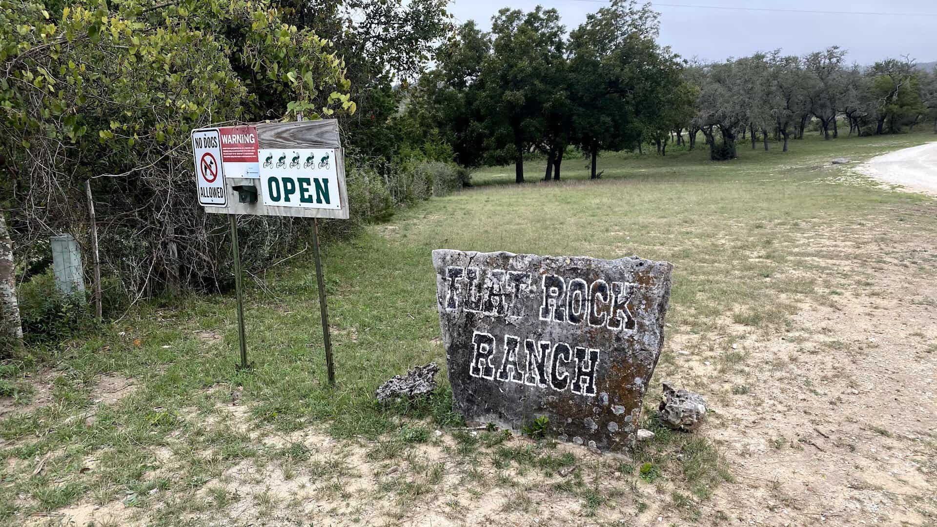 Stone entrance sign at Flat Rock Ranch in Comfort, Texas