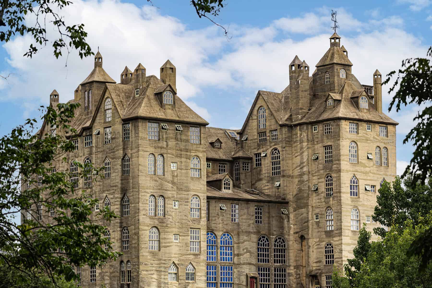 The concrete towers of Fonthill Castle against a blue sky in Doylestown, Pennsylvania