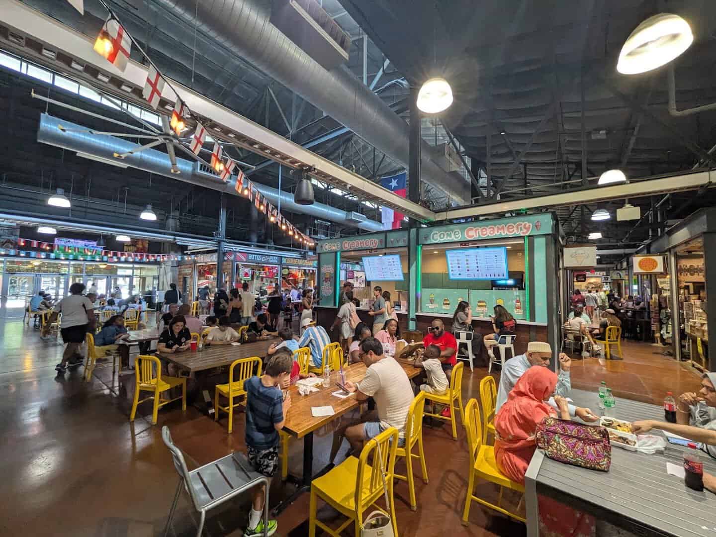 Diners inside the food hall at the Dallas Farmers Market