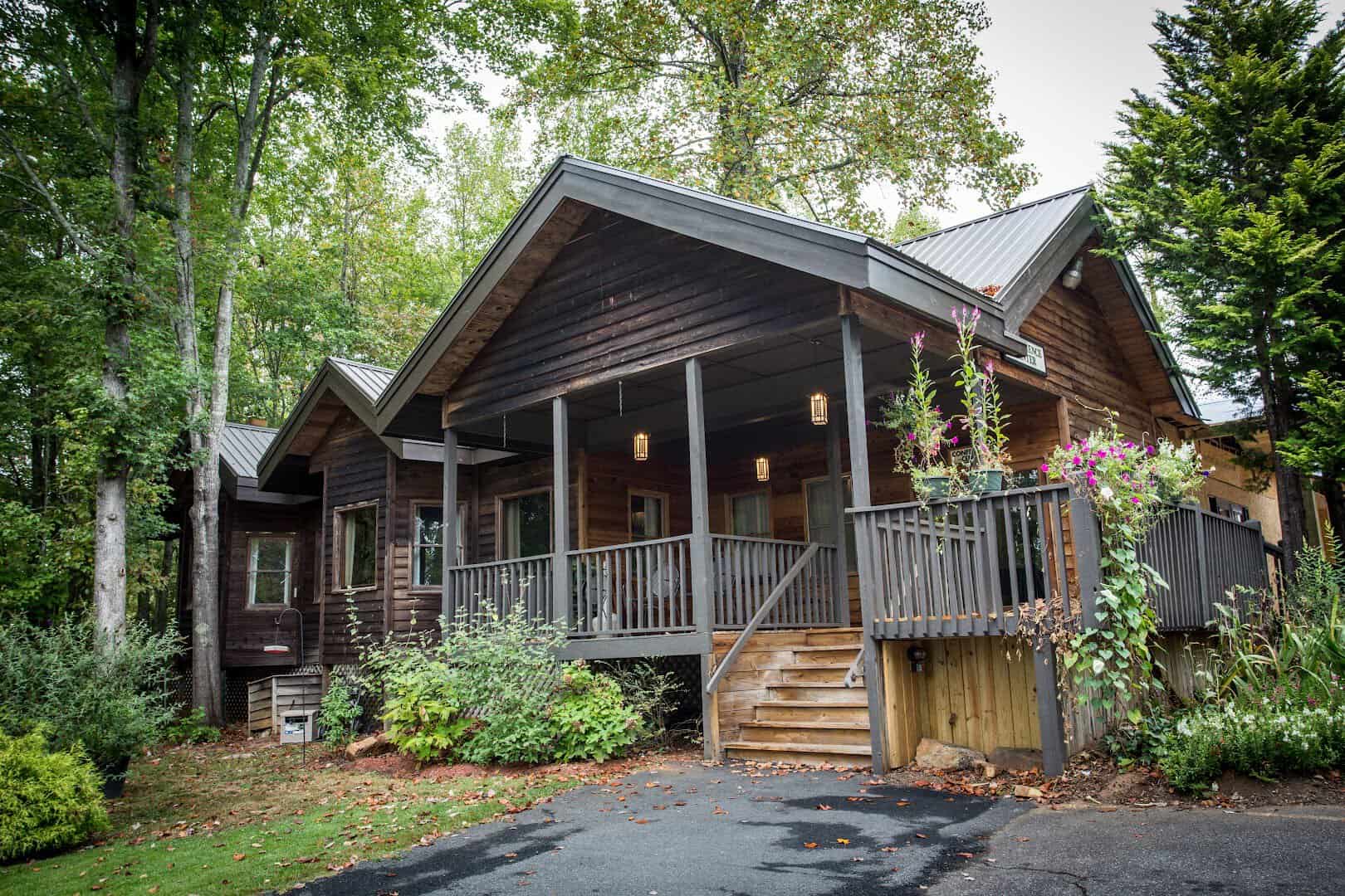 Mountain cabin with porch in the woods at Forrest Hills Resort in Dahlonega, Georgia