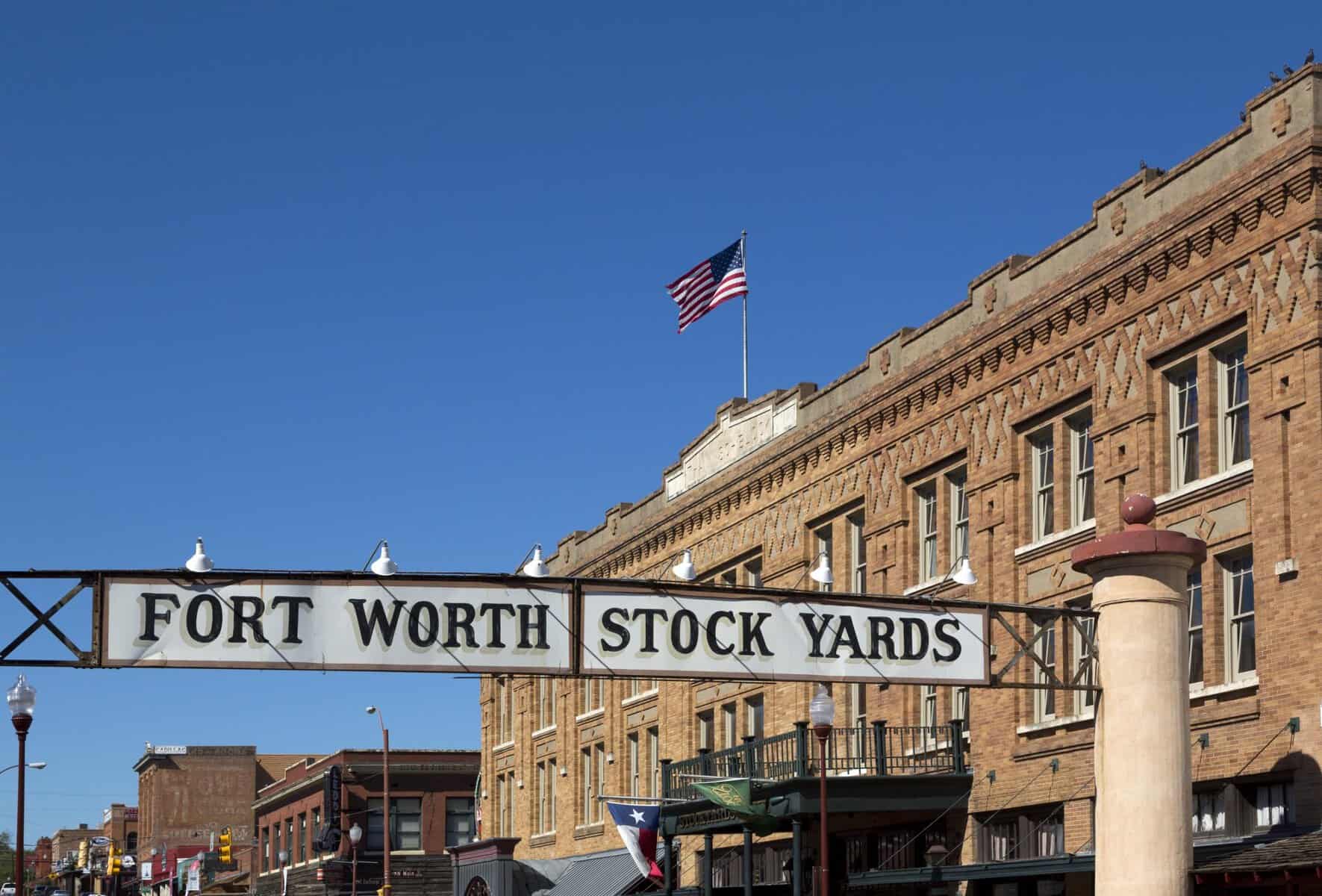 Fort Worth Stockyards gateway sign over Exchange Avenue in Fort Worth, Texas