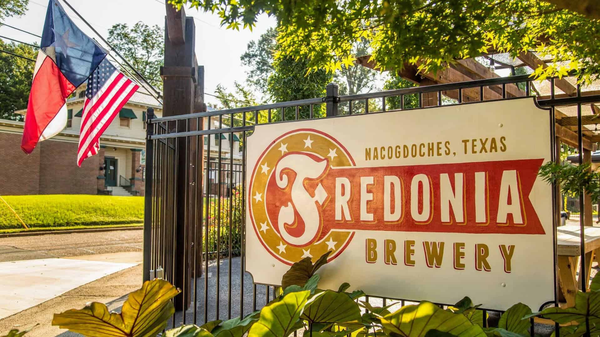 Fredonia Brewery sign and patio in Nacogdoches, Texas