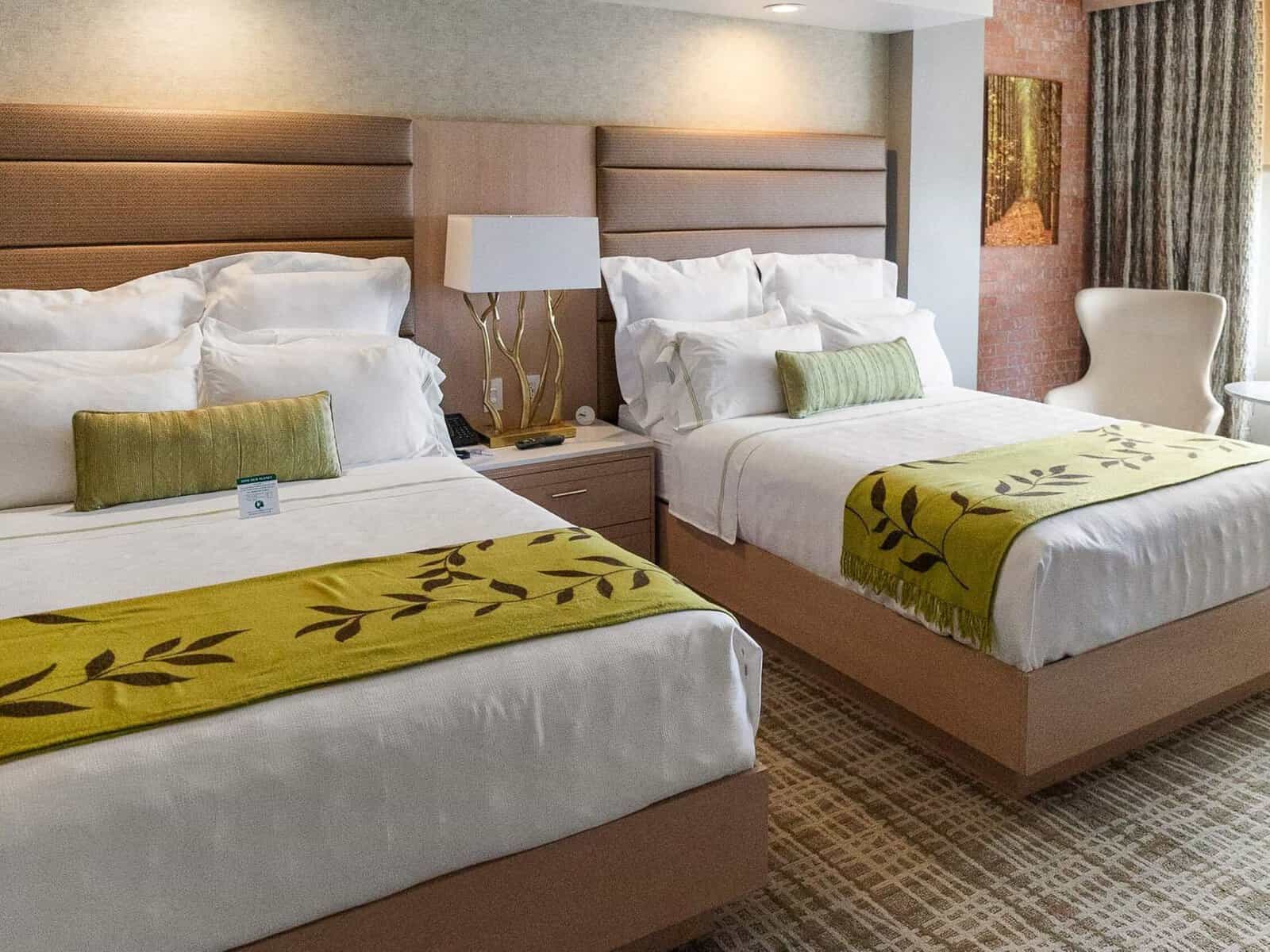 Guest room with two beds at The Fredonia Hotel in Nacogdoches, Texas