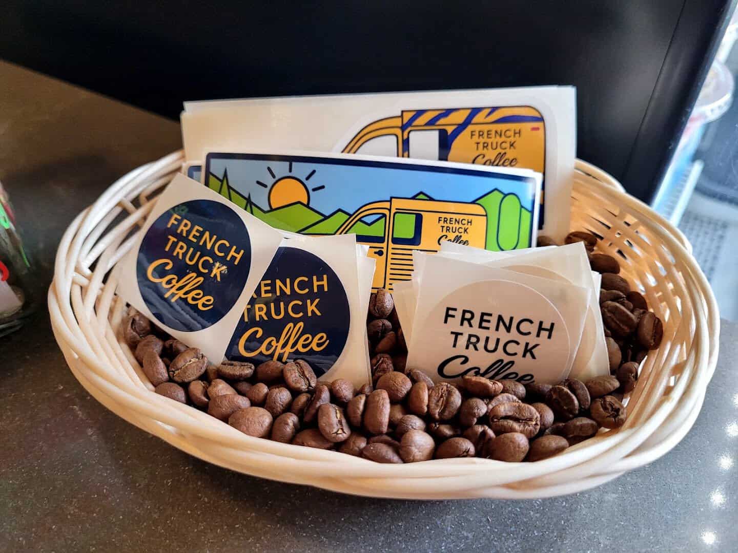 Fresh coffee beans and branded bags at French Truck Coffee in New Orleans