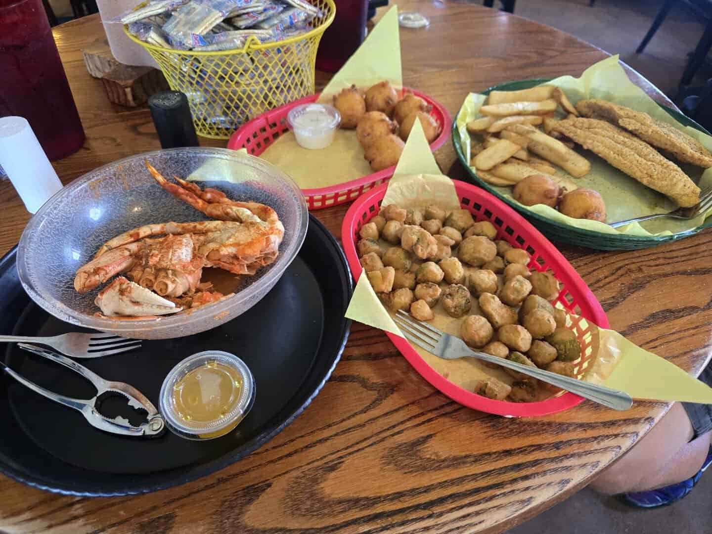 Fried catfish, hushpuppies and fried okra baskets at Fish Shack in Plano, Texas
