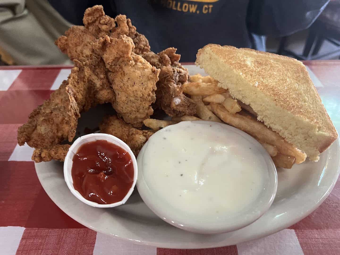 Golden fried chicken strips with toast and cream gravy at Texan Cafe and Pie Shop in Hutto, Texas