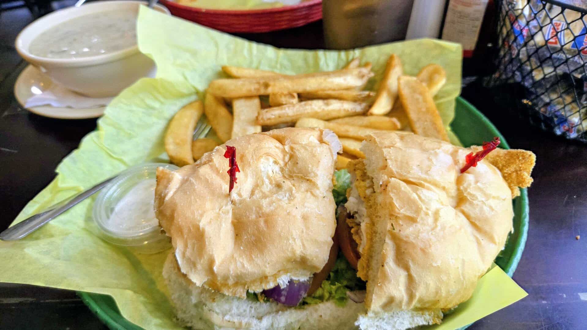 Fried fish po boy with fries and gumbo at Fish Shack in Plano, Texas