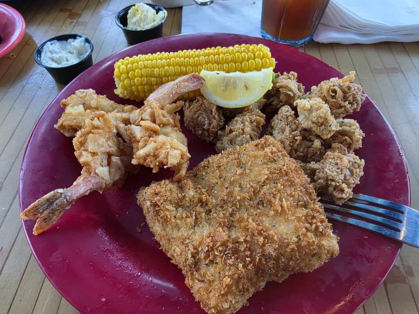 Fried seafood plate with corn at Paradise Key in Rockport, Texas