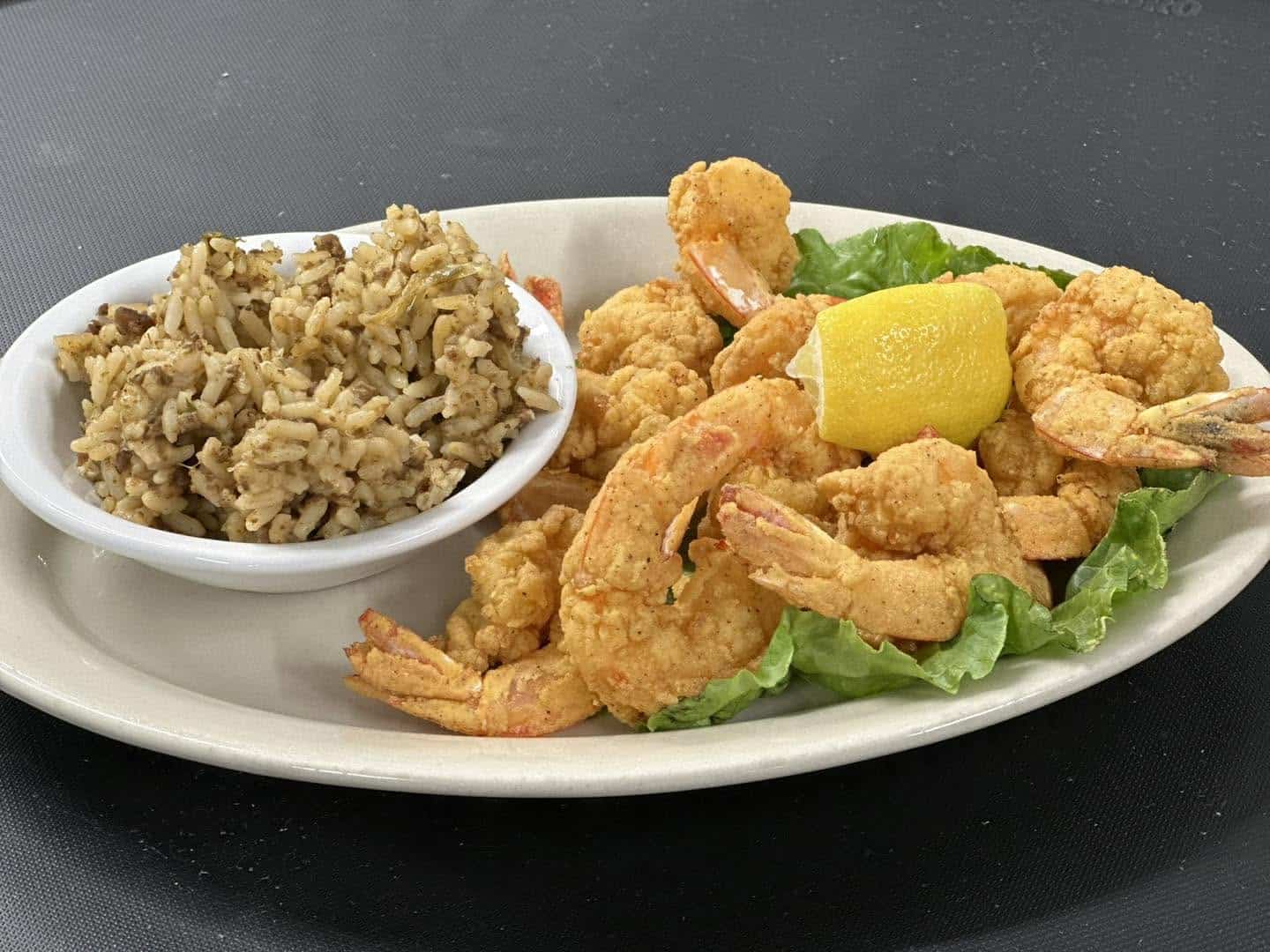 Fried Gulf shrimp with dirty rice at Stingaree in Crystal Beach, Texas