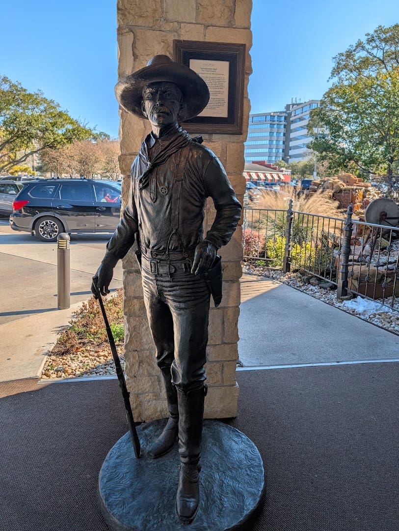 Bronze frontiersman statue at the entrance of Taste of Texas in Houston