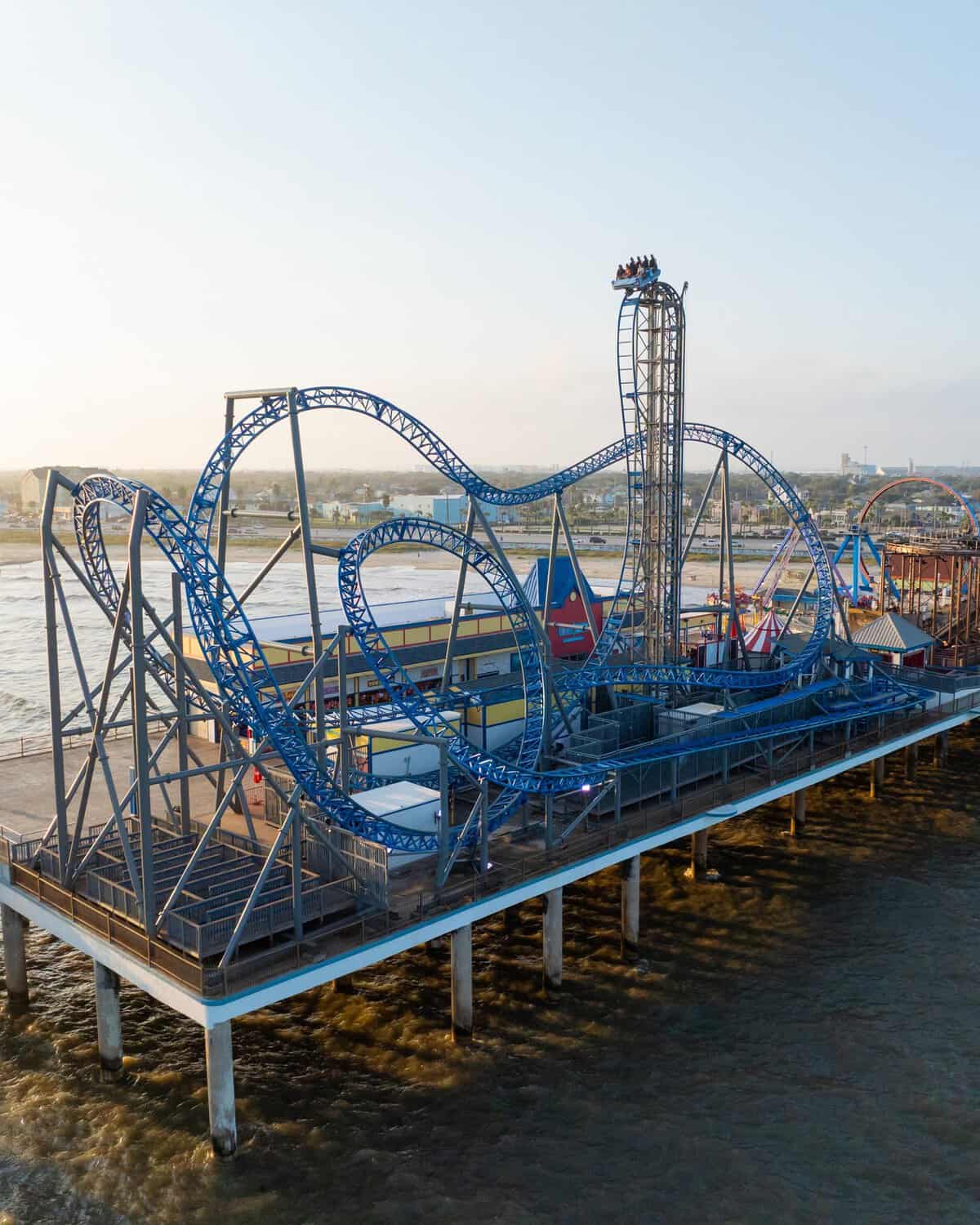Roller coaster on the Galveston Island Historic Pleasure Pier over the Gulf