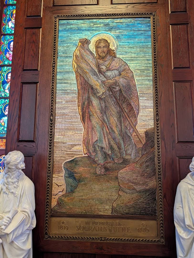 Figural stained glass window of a saint at the Gelman Stained Glass Museum in San Juan, Texas