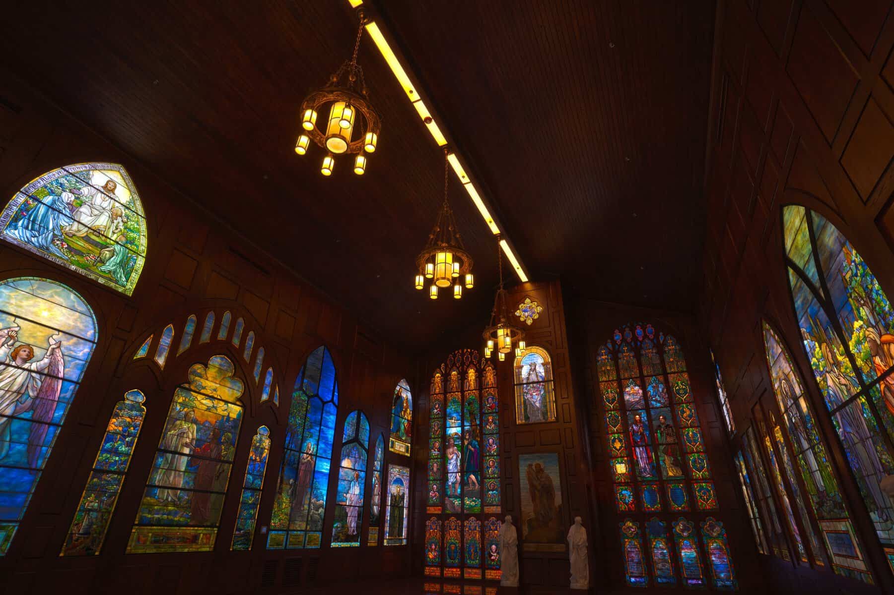 Glowing gallery of stained glass windows at the Gelman Stained Glass Museum in San Juan, Texas